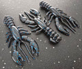 Three sapper baits breacher craw in black with Blue Flake