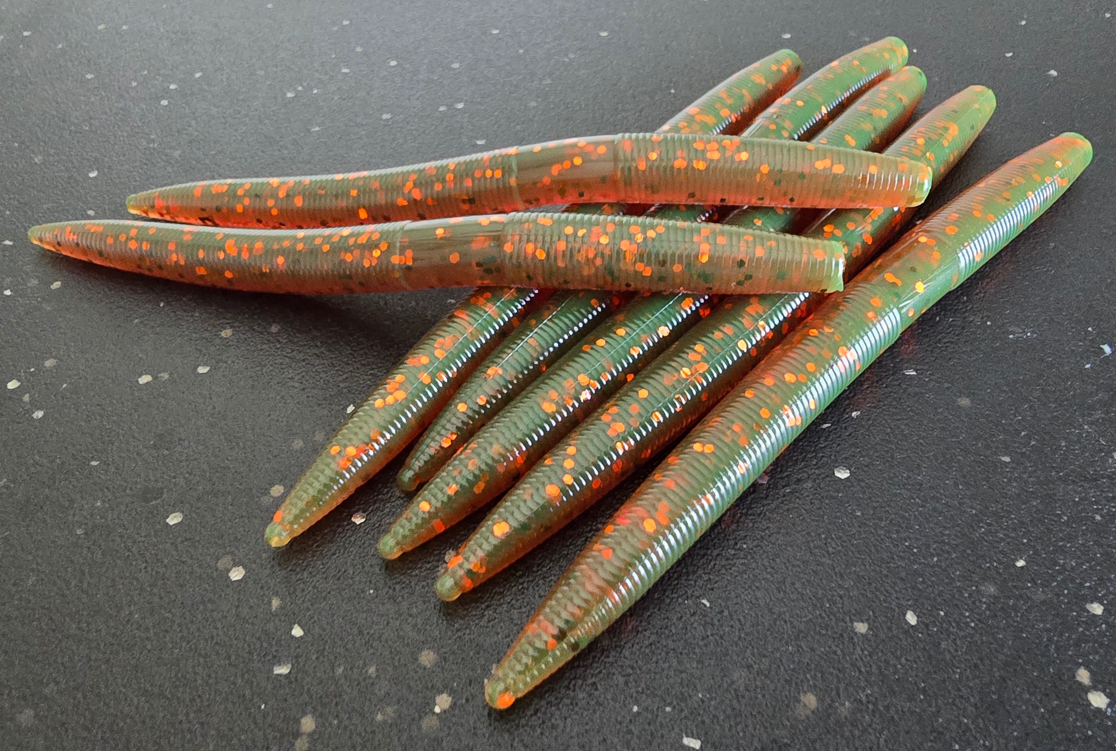 Motor Oil Stick Bait with Orange and Bronze Flake